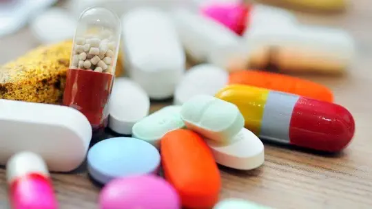 Close-up of different colored pills
Description automatically generated Close-up of different colored pills
Description automatically generated